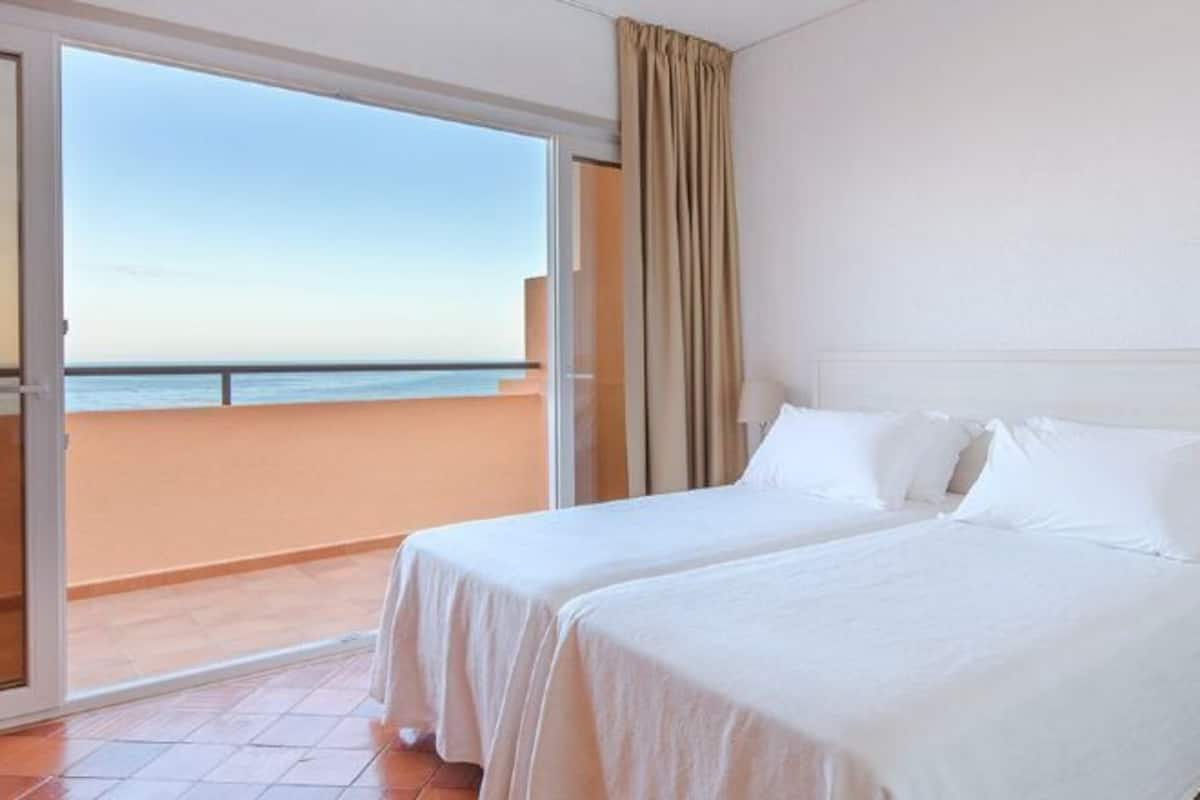 Blackout curtains, soundproofing, free WiFi, bed sheets