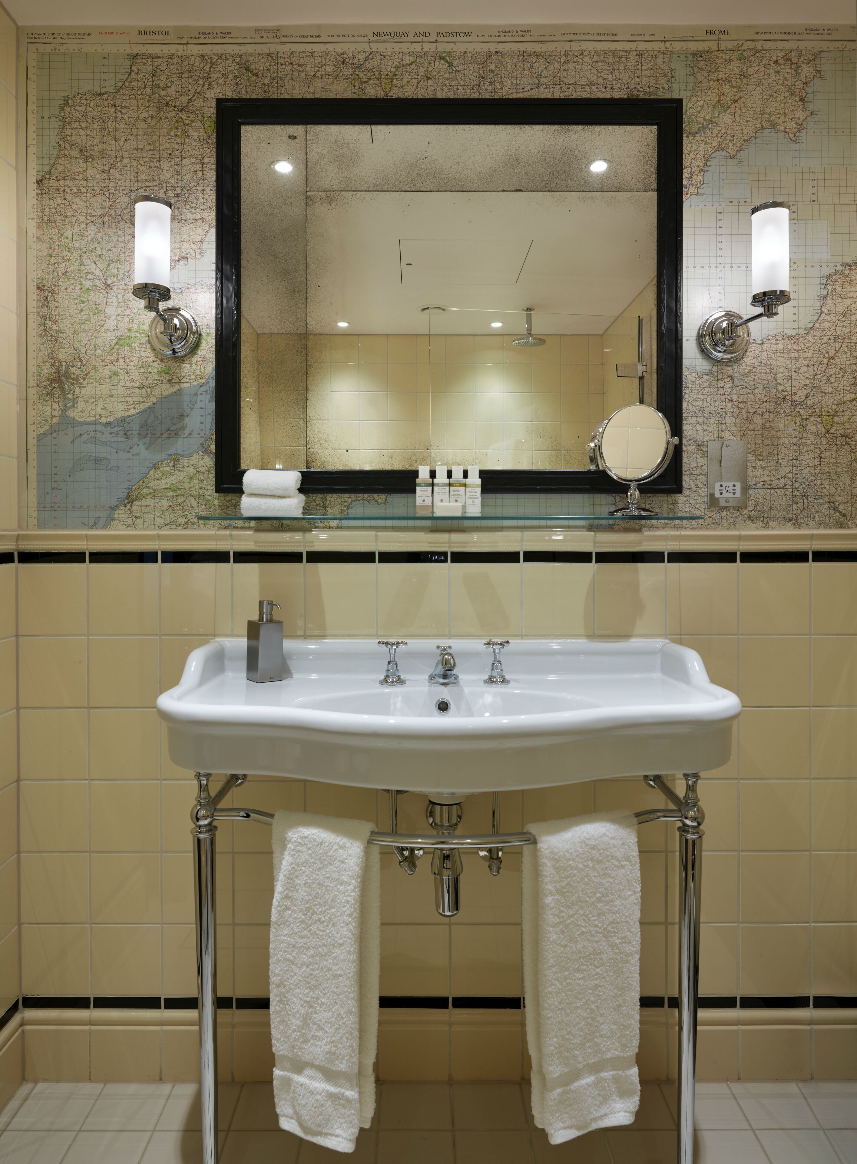 deluxe king room | bathroom | shower, rainfall showerhead, designer toiletries, hair dryer