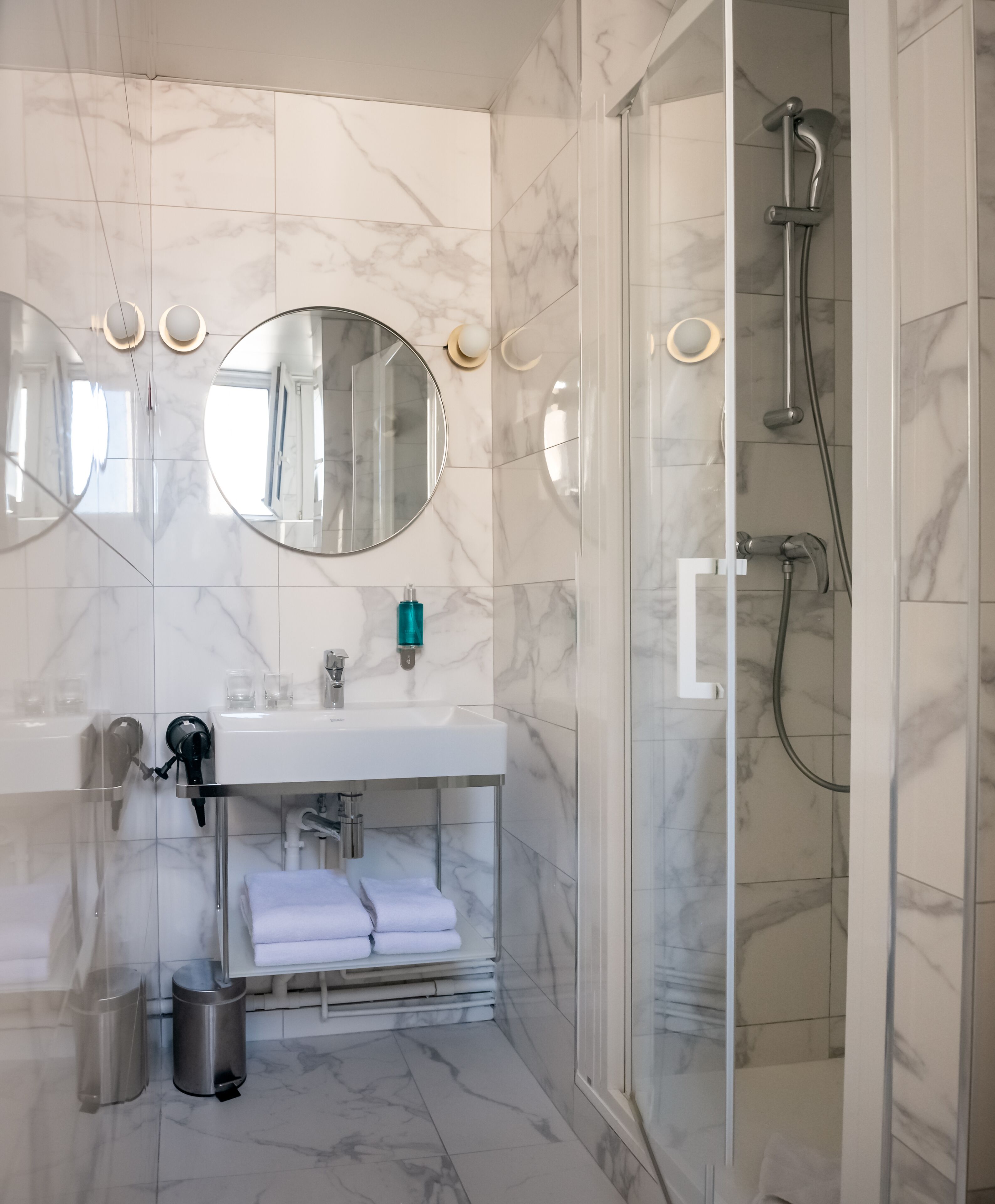 free toiletries, hair dryer, towels, shampoo