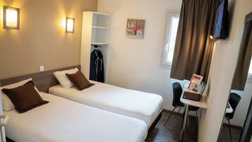 Bureau, rideaux occultants, chambres insonorisées
