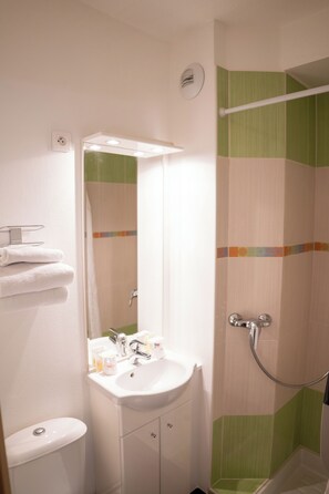 Shower, free toiletries, hair dryer, towels