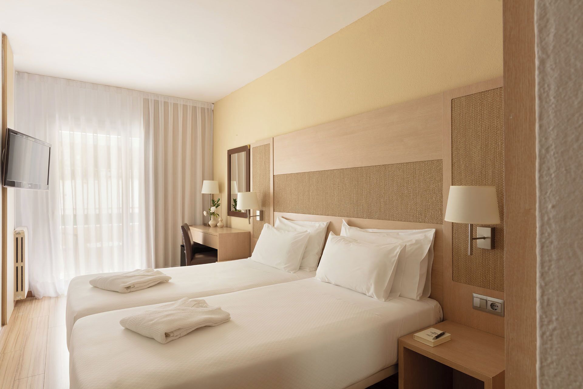 Premium bedding, blackout curtains, soundproofing, free WiFi