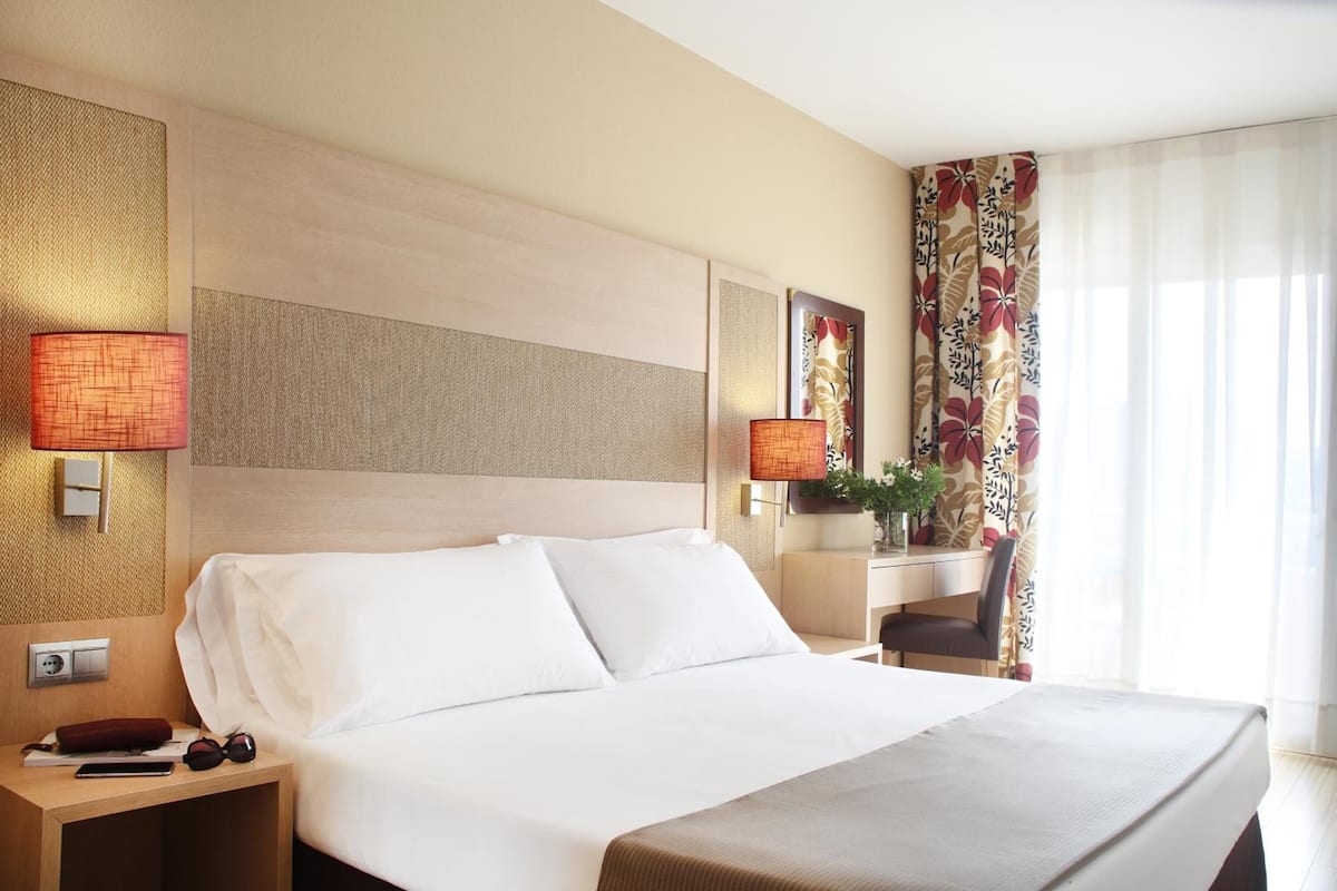 Ropa de cama de alta calidad y cortinas blackout