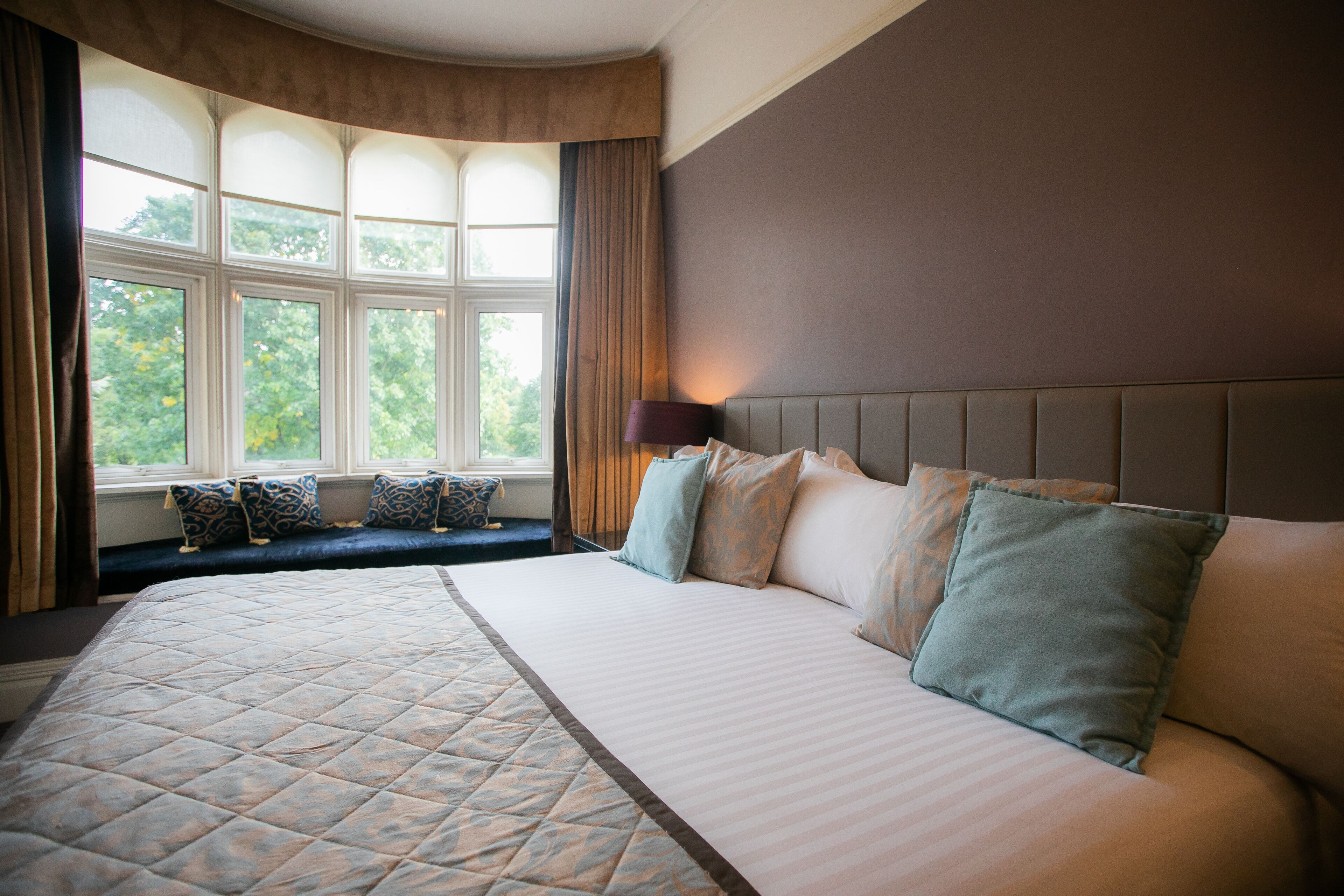 junior suite, 1 king bed, garden view | premium bedding, in-room safe, desk, laptop workspace