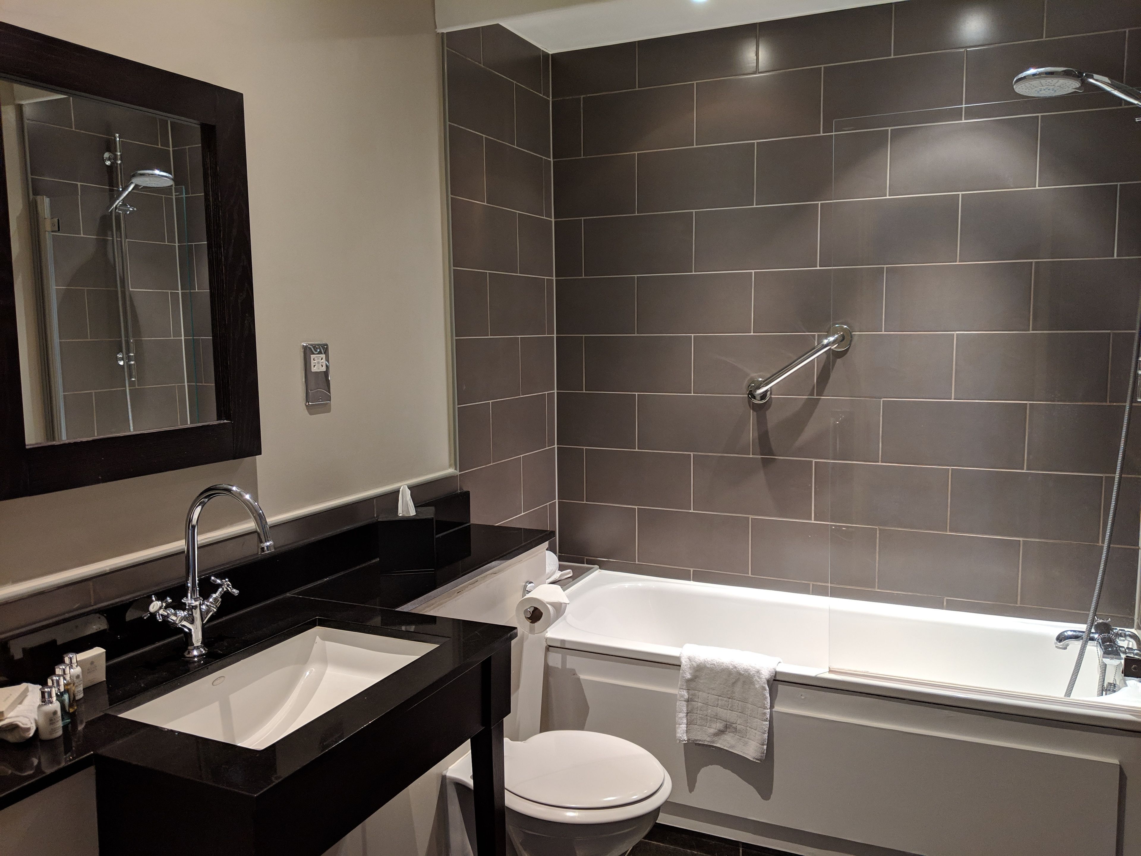 combined shower/bathtub, free toiletries, hair dryer, towels