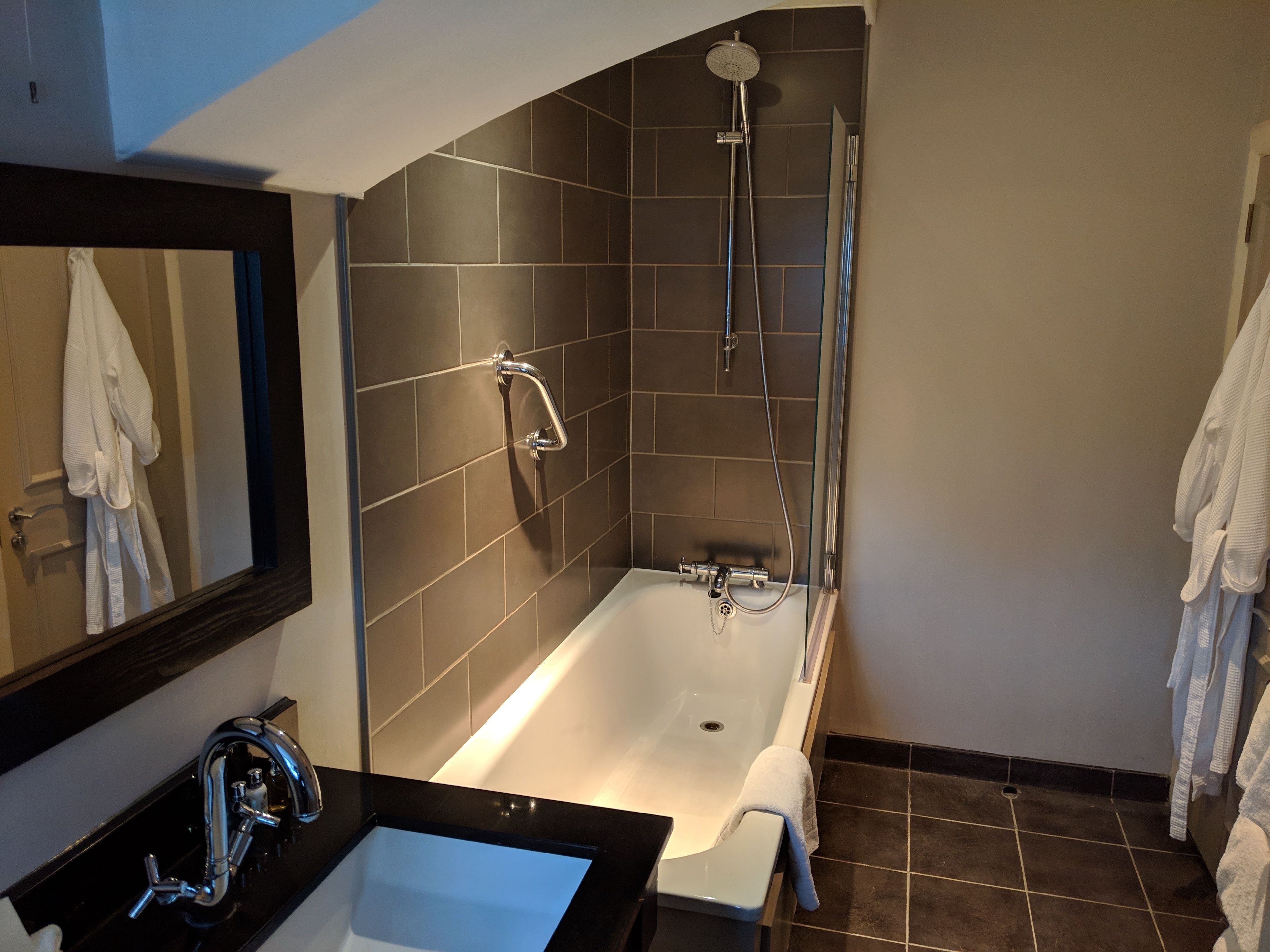 superior double room single use, 1 double bed, garden view | bathroom | combined shower/bathtub, free toiletries, hair dryer, towels