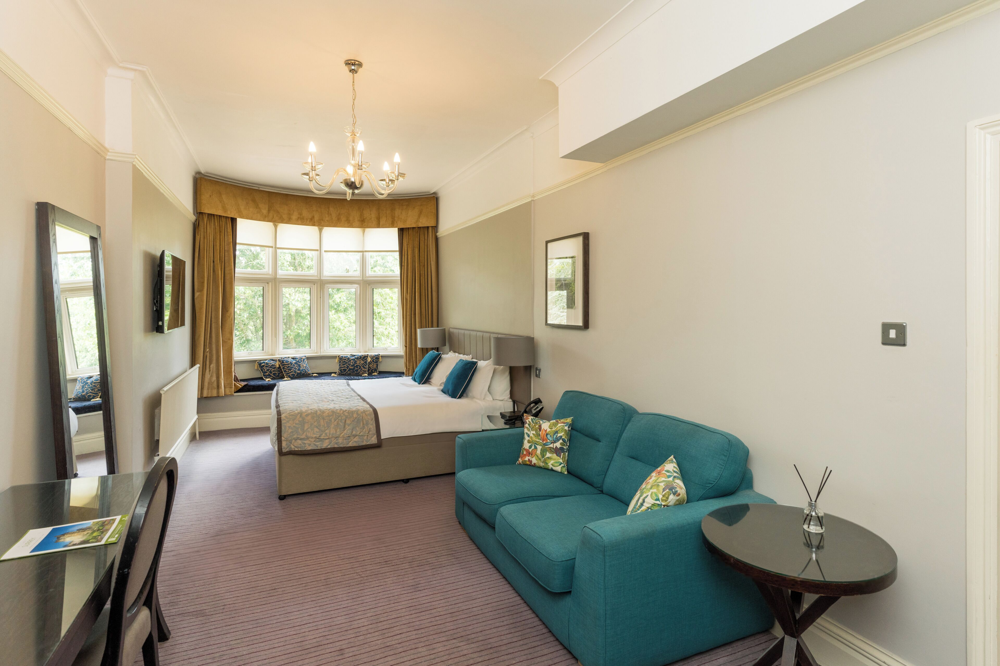 junior suite, 1 king bed, garden view | premium bedding, in-room safe, desk, laptop workspace