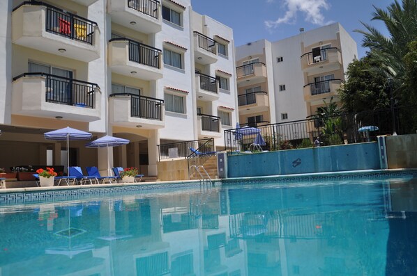 2 outdoor pools, open 10:00 AM to 6:30 PM, pool loungers