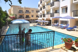 2 outdoor pools, open 10:00 AM to 6:30 PM, pool loungers