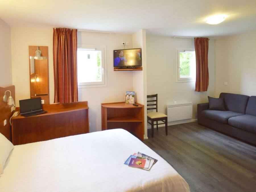 Individually furnished, desk, laptop workspace, blackout drapes