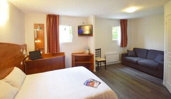 Individually furnished, desk, laptop workspace, blackout drapes