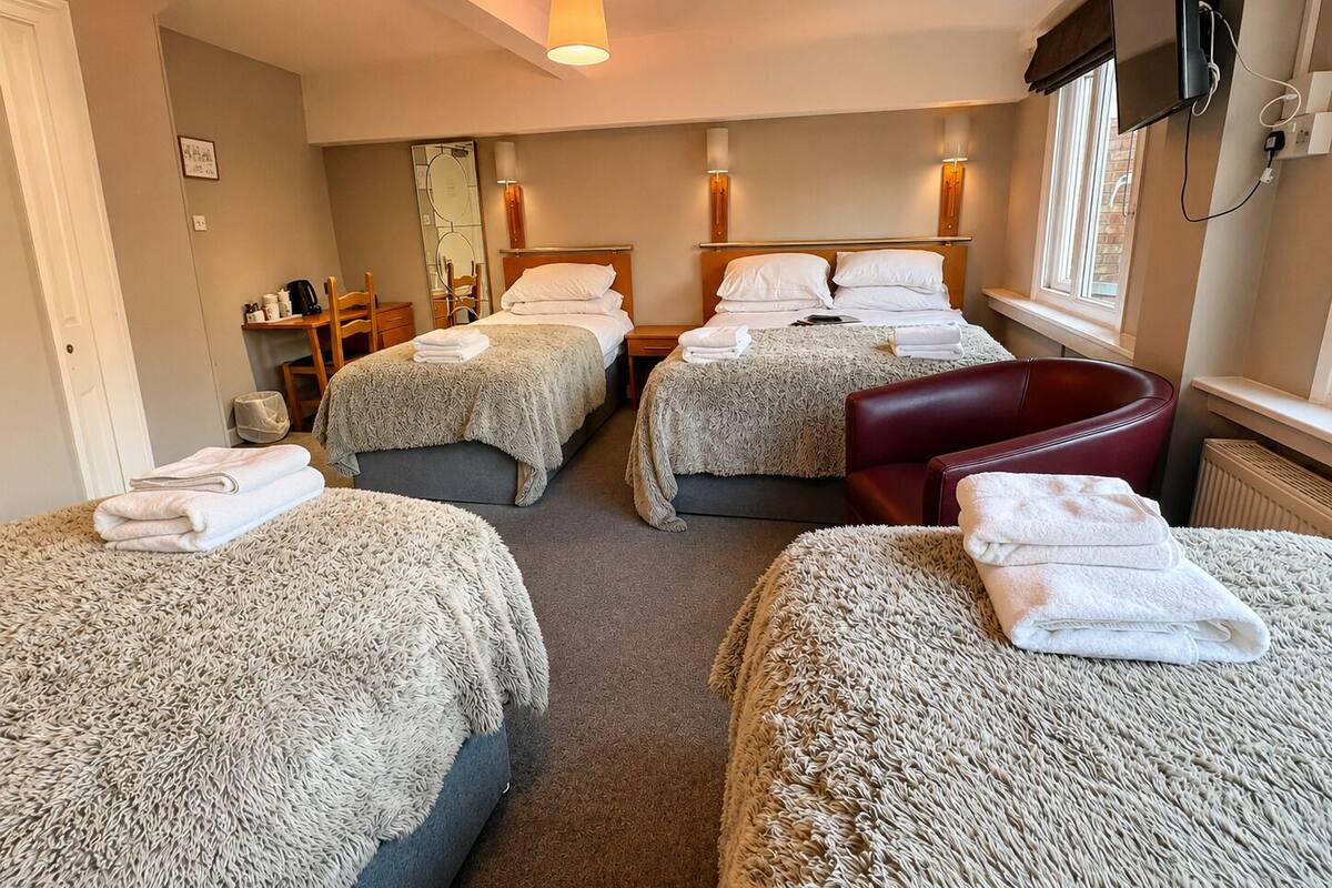 Premium bedding, desk, laptop workspace, WiFi