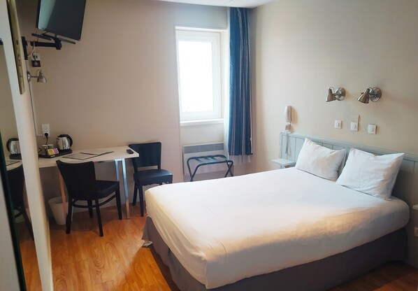 Desk, blackout drapes, soundproofing, iron/ironing board