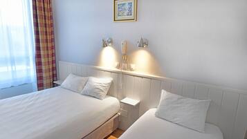 Triple Room | Desk, blackout drapes, soundproofing, iron/ironing board