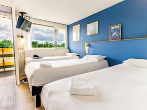 Room, 3 Twin Beds (Pop) | Desk, blackout drapes, soundproofing, iron/ironing board