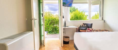 Desk, blackout drapes, soundproofing, iron/ironing board