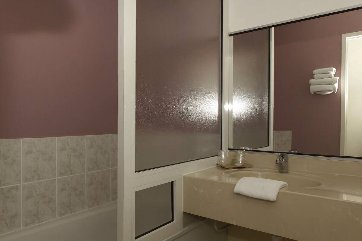 blackout curtains, iron/ironing board, free wifi, bed sheets