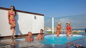 Enjoy a refreshing swim with a stunning city view from our rooftop pool.
