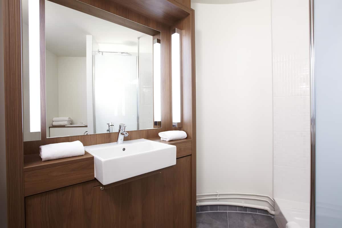 shower, eco-friendly toiletries, hair dryer, towels