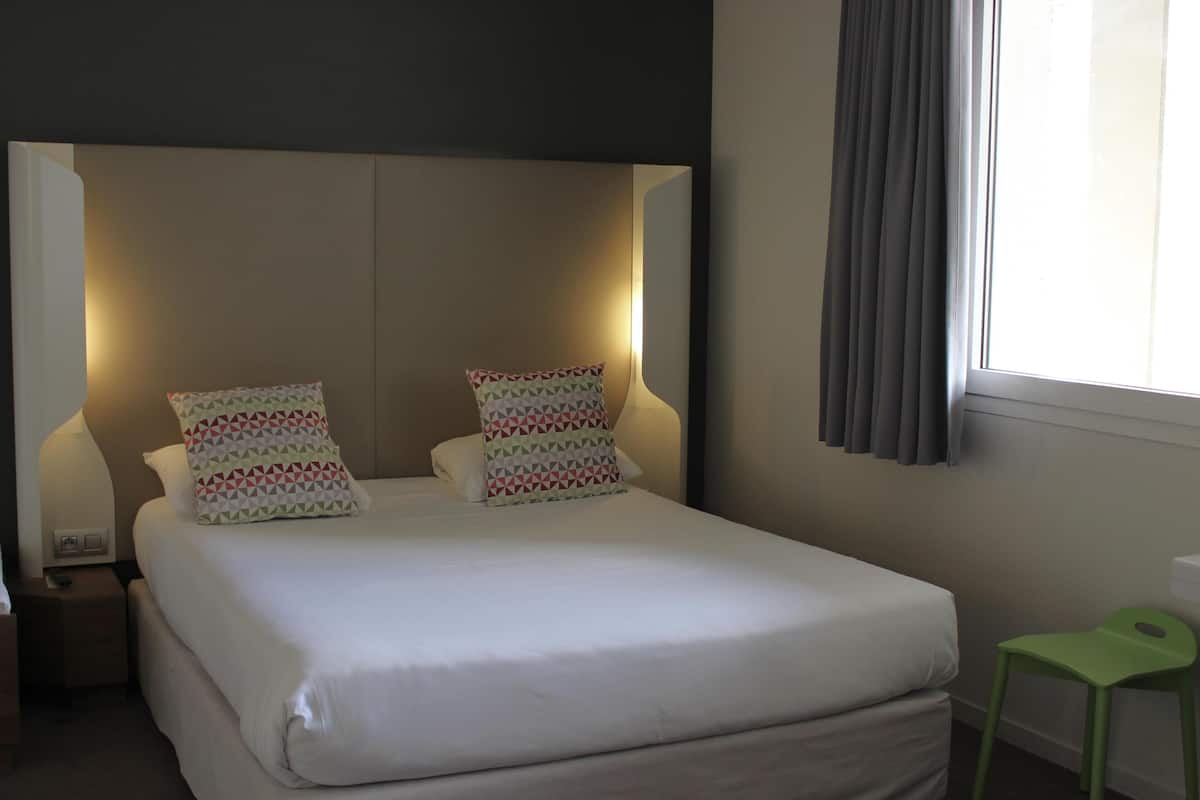 Desk, blackout drapes, soundproofing, free cribs/infant beds