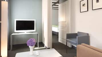 Familiekamer | 1 slaapkamer, luxe beddengoed, een minibar, een kluis op de kamer