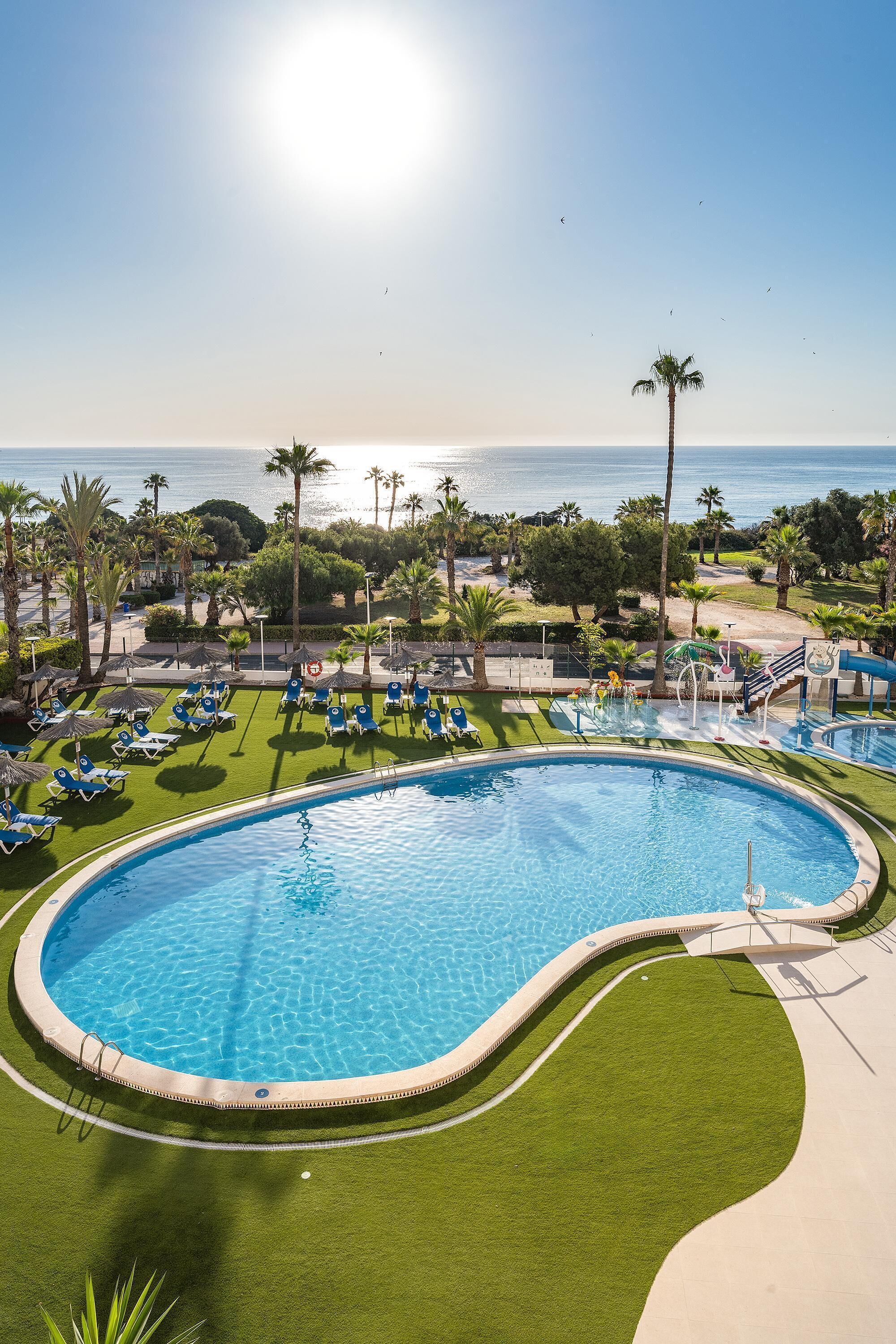 2 outdoor pools, pool umbrellas, pool loungers