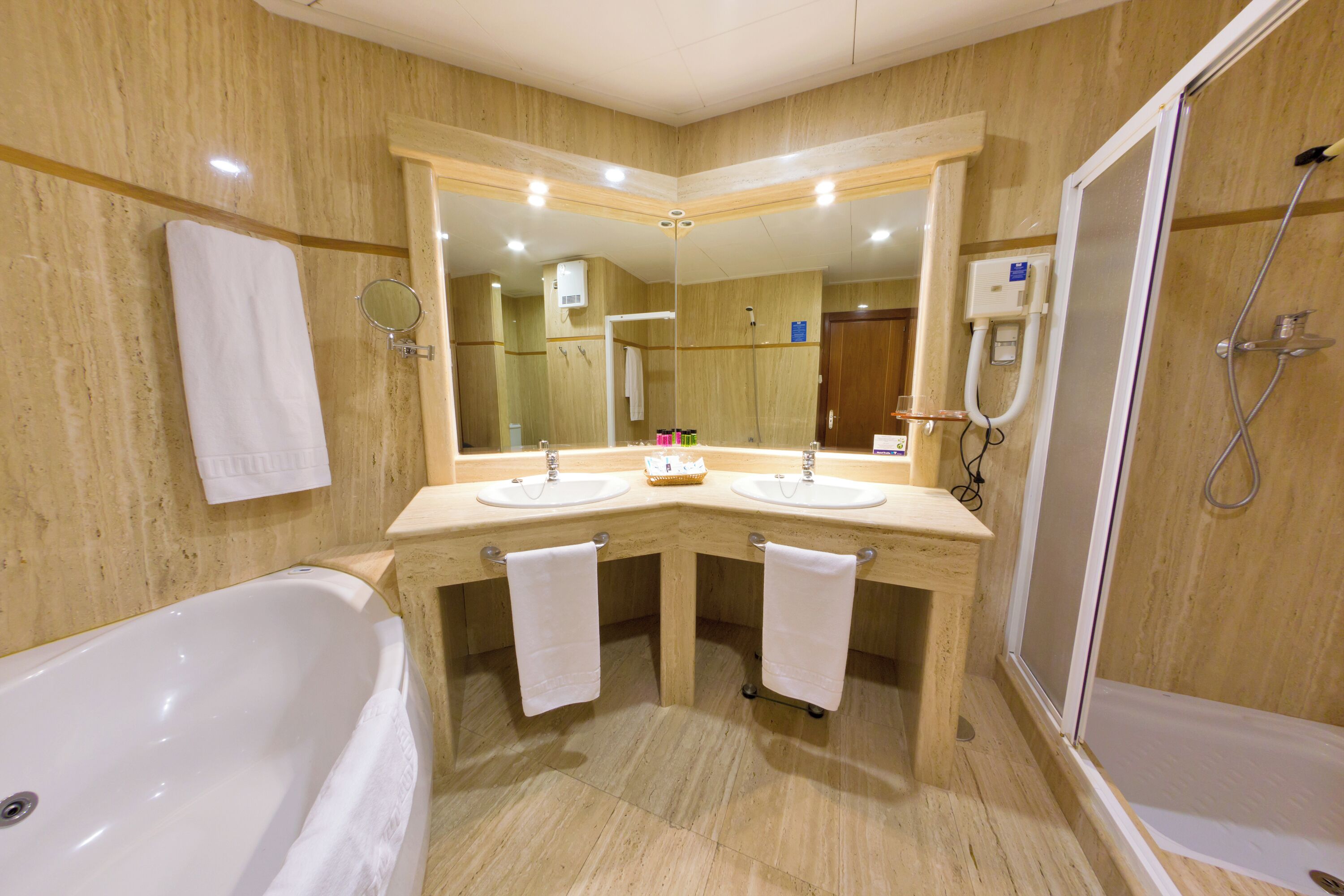 junior studio suite | bathroom | free toiletries, hair dryer, bidet, towels
