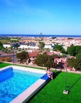 Outdoor pool, open 10:00 AM to 8:00 PM, pool umbrellas, sun loungers