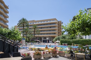 Outdoor pool, open 10:00 AM to 6:00 PM, pool umbrellas, sun loungers