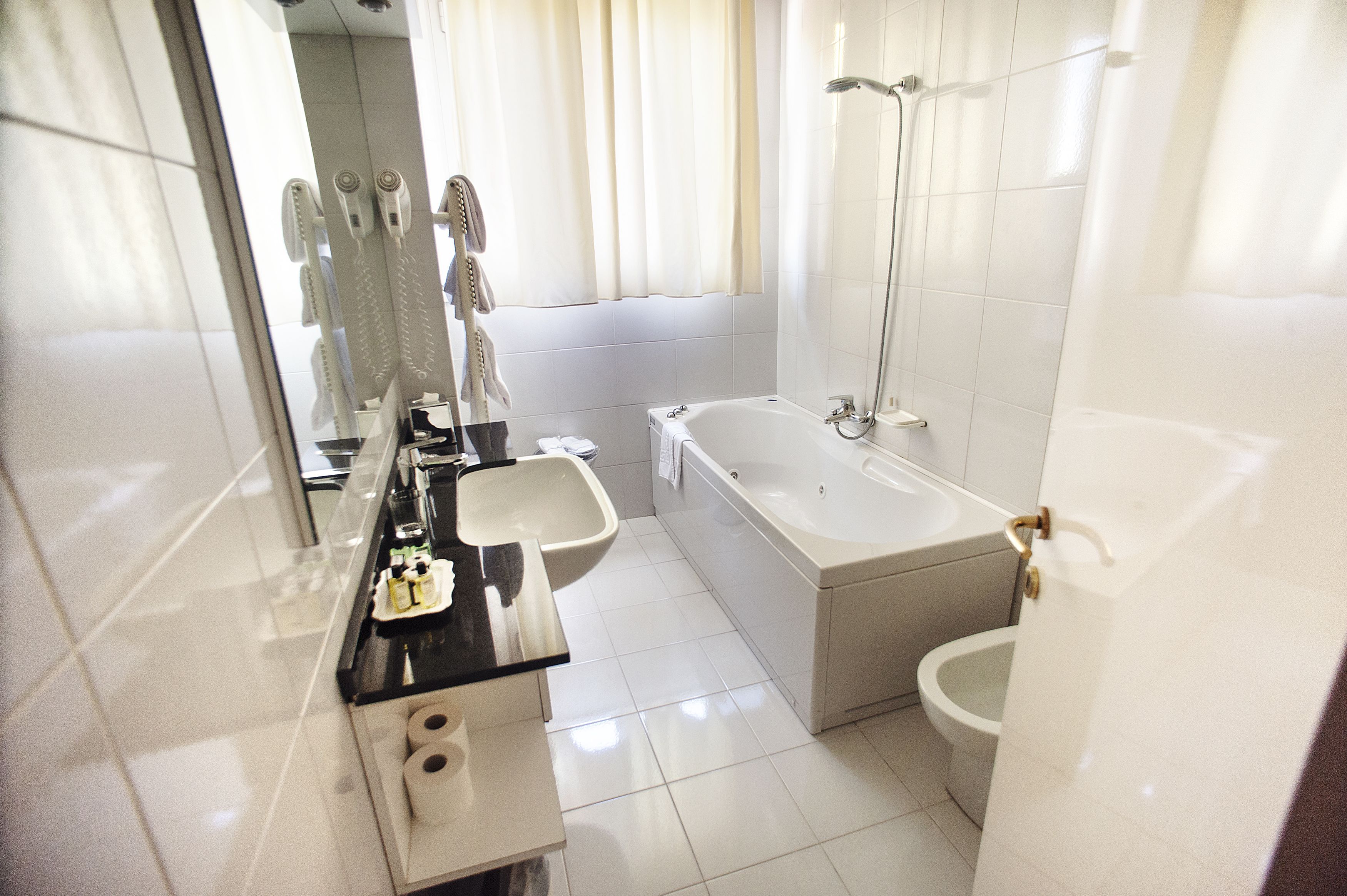 rainfall showerhead, free toiletries, hair dryer, slippers