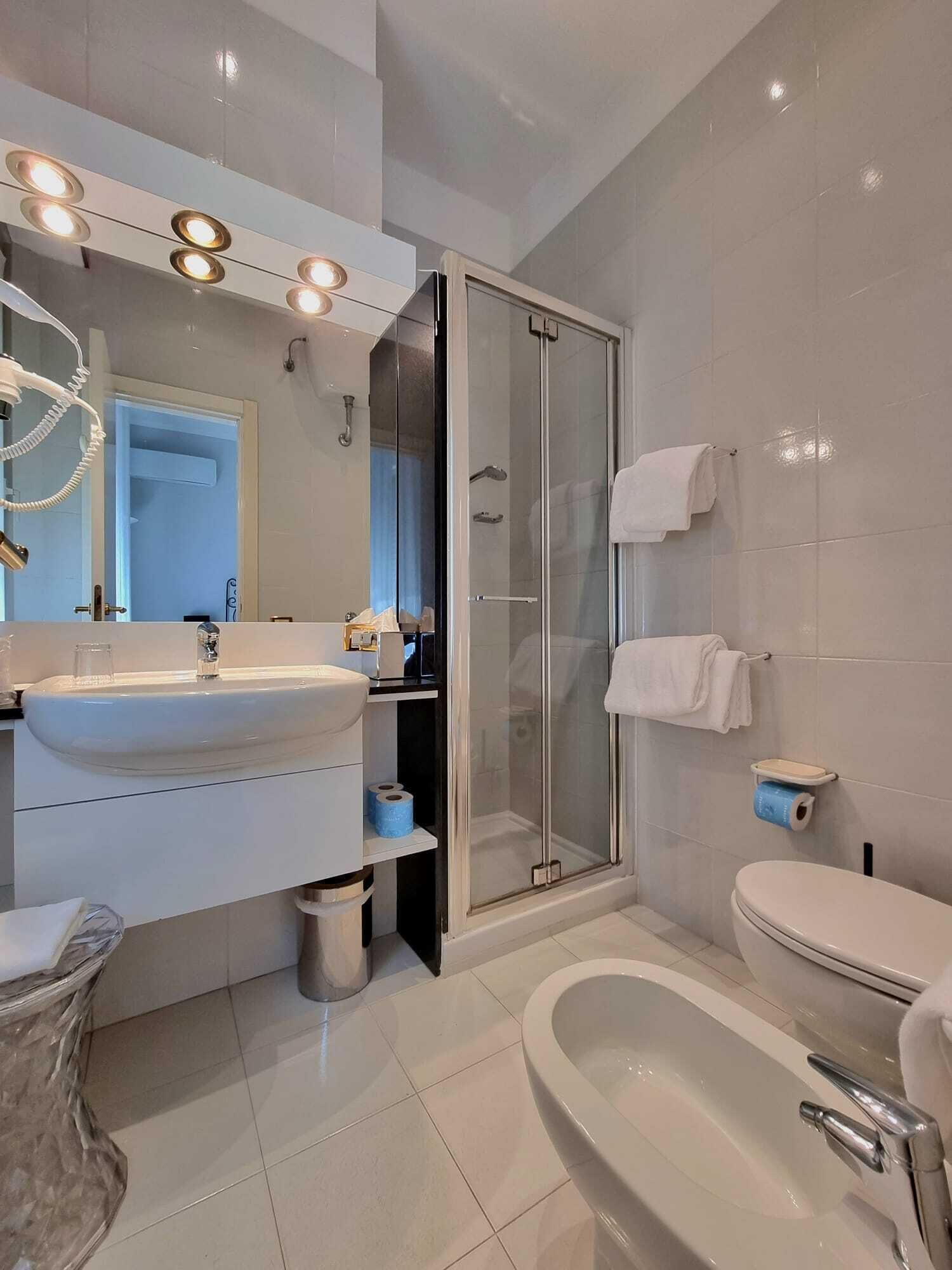 rainfall showerhead, free toiletries, hair dryer, slippers