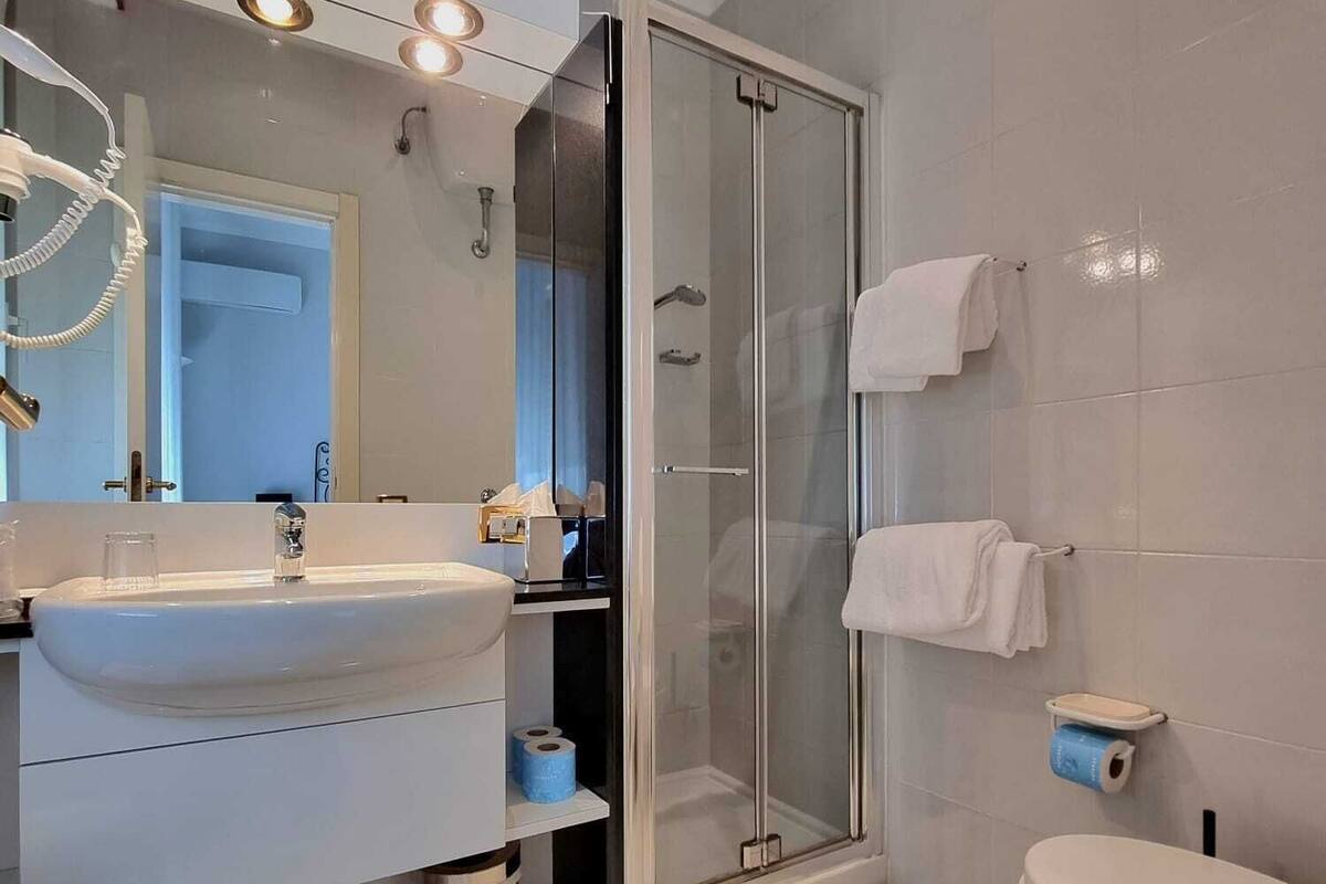 rainfall showerhead, free toiletries, hair dryer, slippers