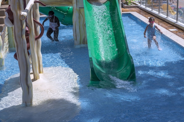 Indoor pool, 2 outdoor pools, open 10:00 AM to 8:00 PM, pool umbrellas