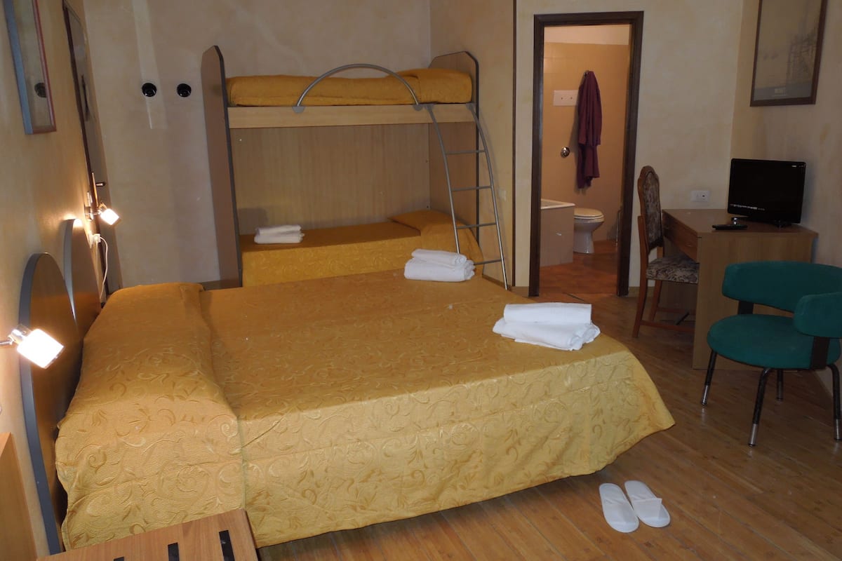 Superior Quadruple Room, Lake View | Frette Italian sheets, minibar, in-room safe, blackout drapes
