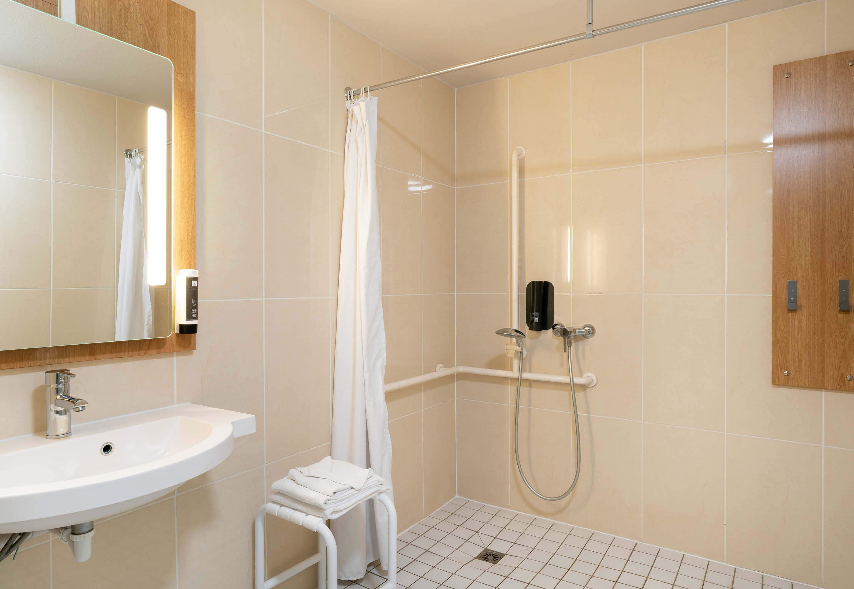 double room, 1 queen bed, mobility accessible, non smoking | bathroom | shower, hair dryer, towels