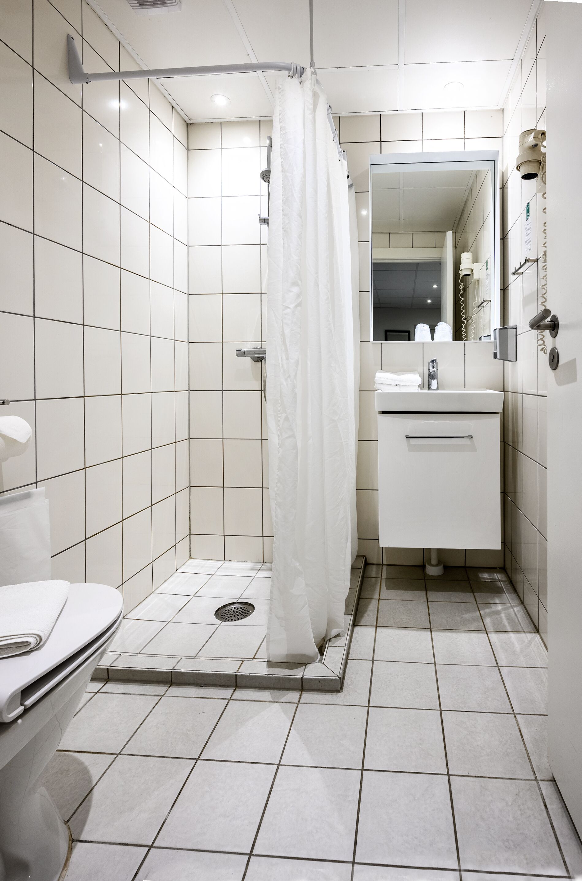 standard double room, private bathroom | bathroom | hair dryer, towels