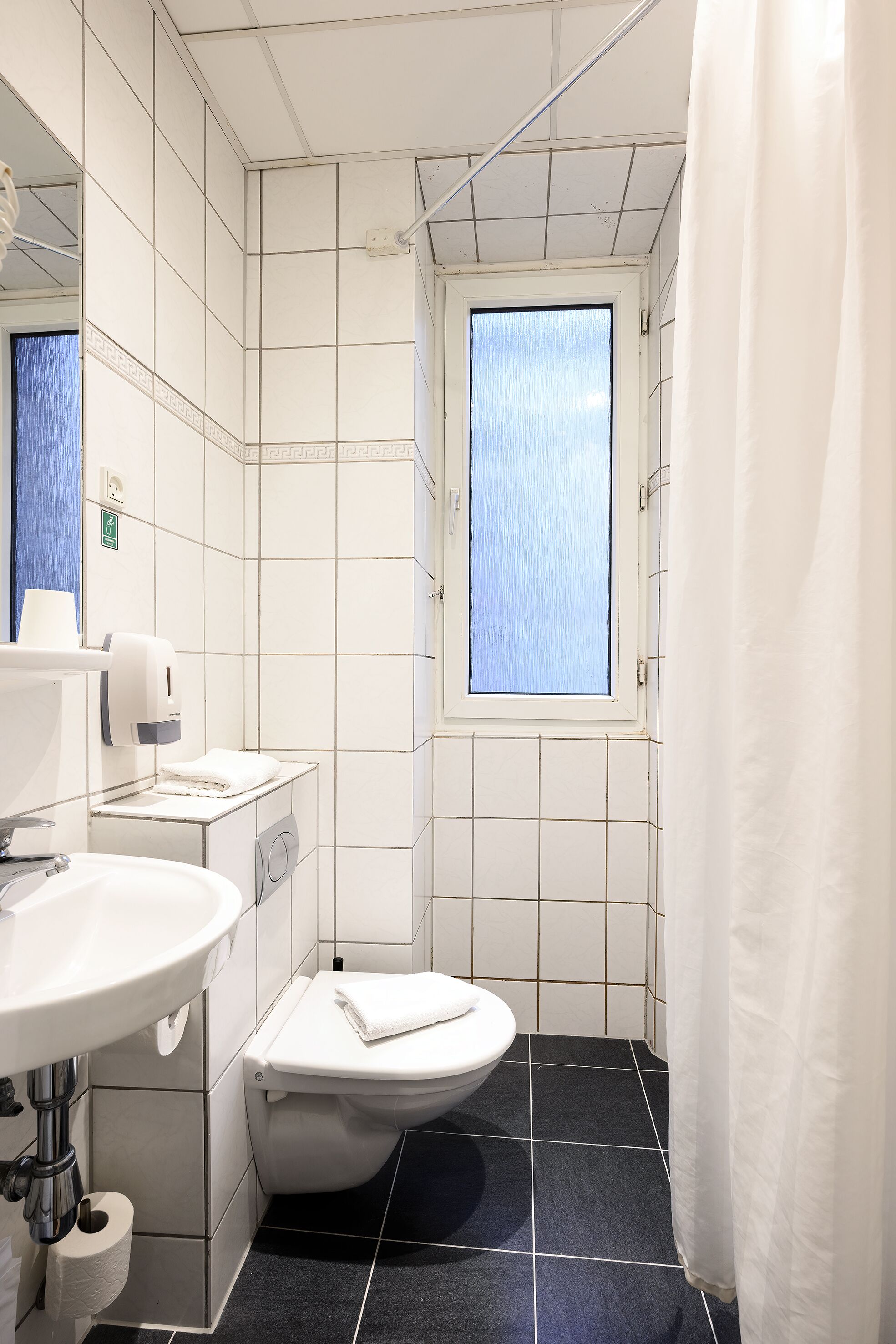 standard triple room, private bathroom (single beds) | bathroom | hair dryer, towels