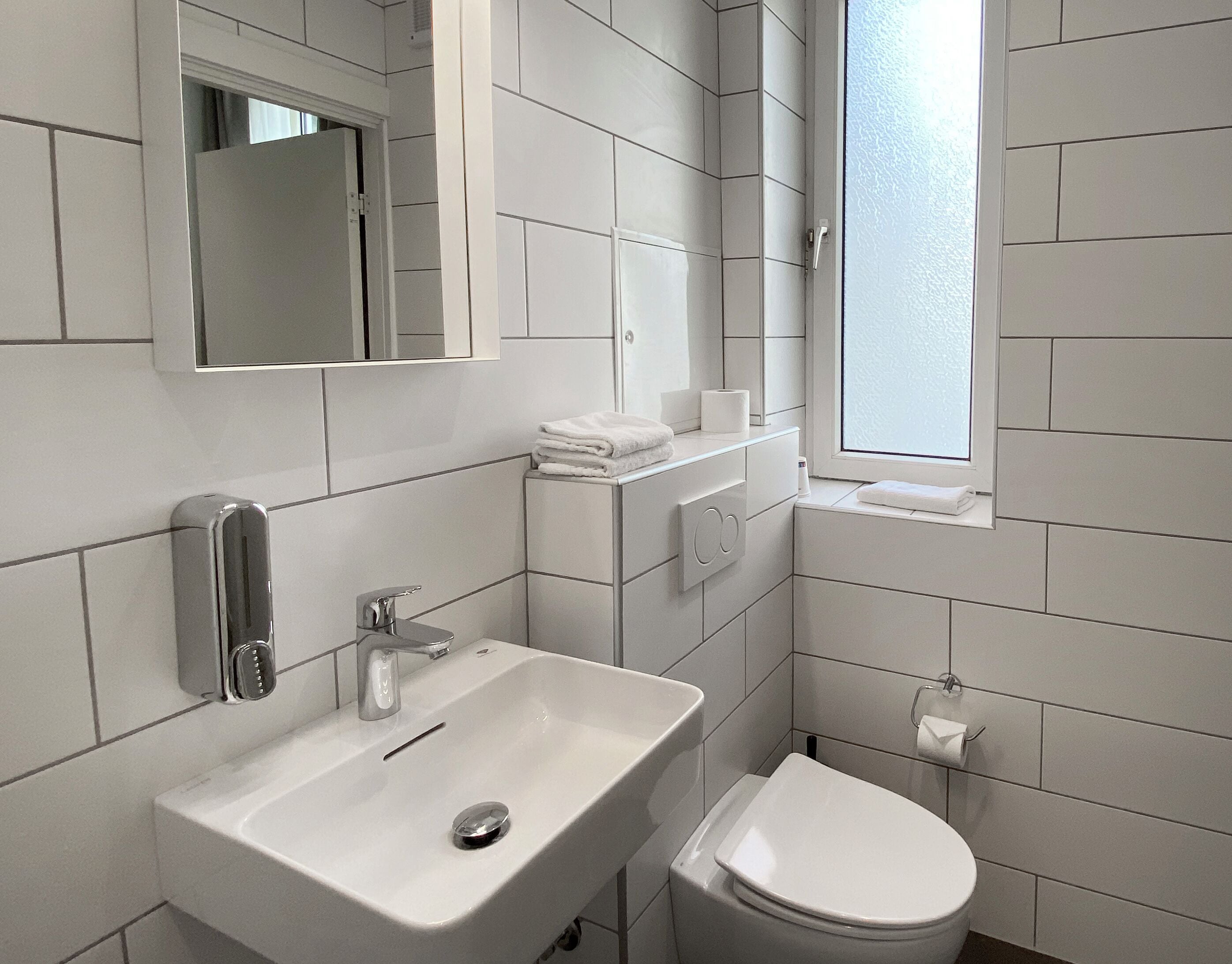 standard triple room, private bathroom (double bed and sofa bed) | bathroom | hair dryer, towels