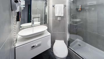 Shower, free toiletries, hair dryer, towels