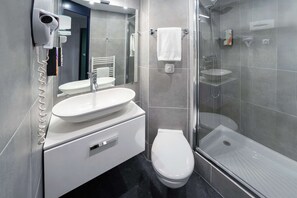 Shower, free toiletries, hair dryer, towels