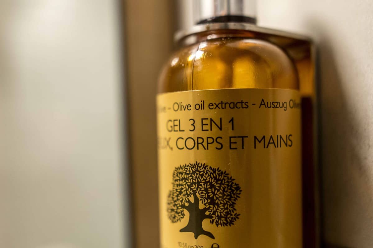 combined shower/bathtub, hair dryer, towels, soap