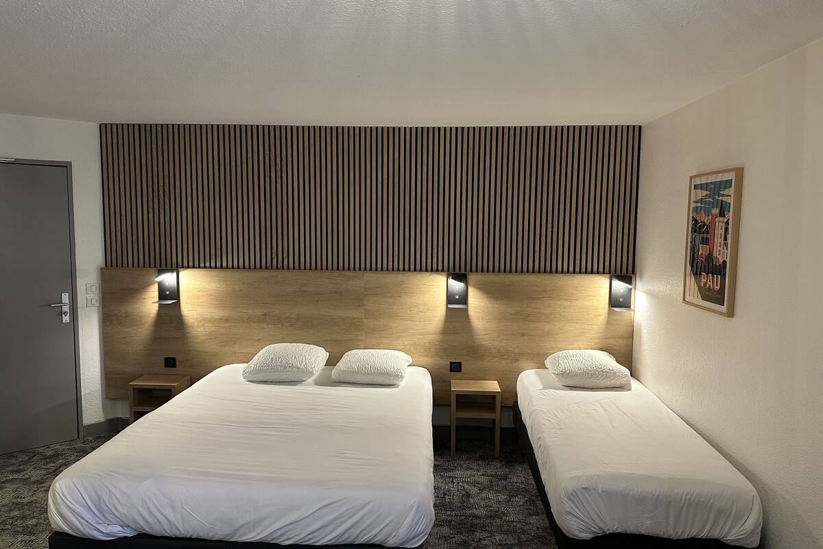 family room, multiple beds, non smoking (shower only) | 1 bedroom, individually decorated, individually furnished, desk