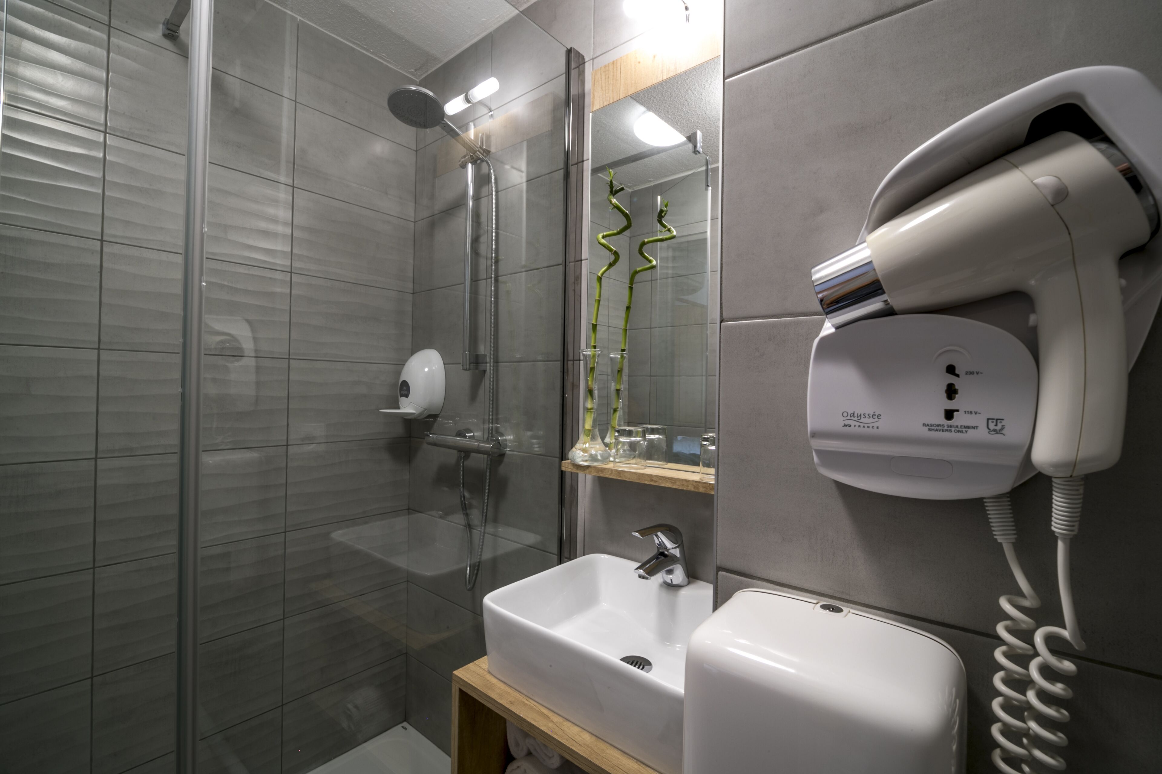 combined shower/bathtub, hair dryer, towels, soap