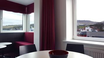 Large Room with Sea View | Living room | Flat-screen TV