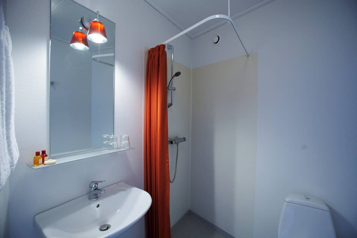 Shower, free toiletries, hair dryer, towels