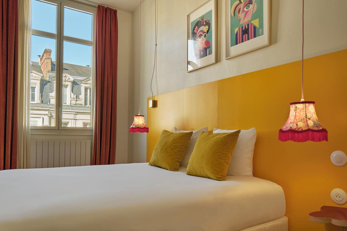 triple room | pillow-top beds, desk, blackout curtains, soundproofing