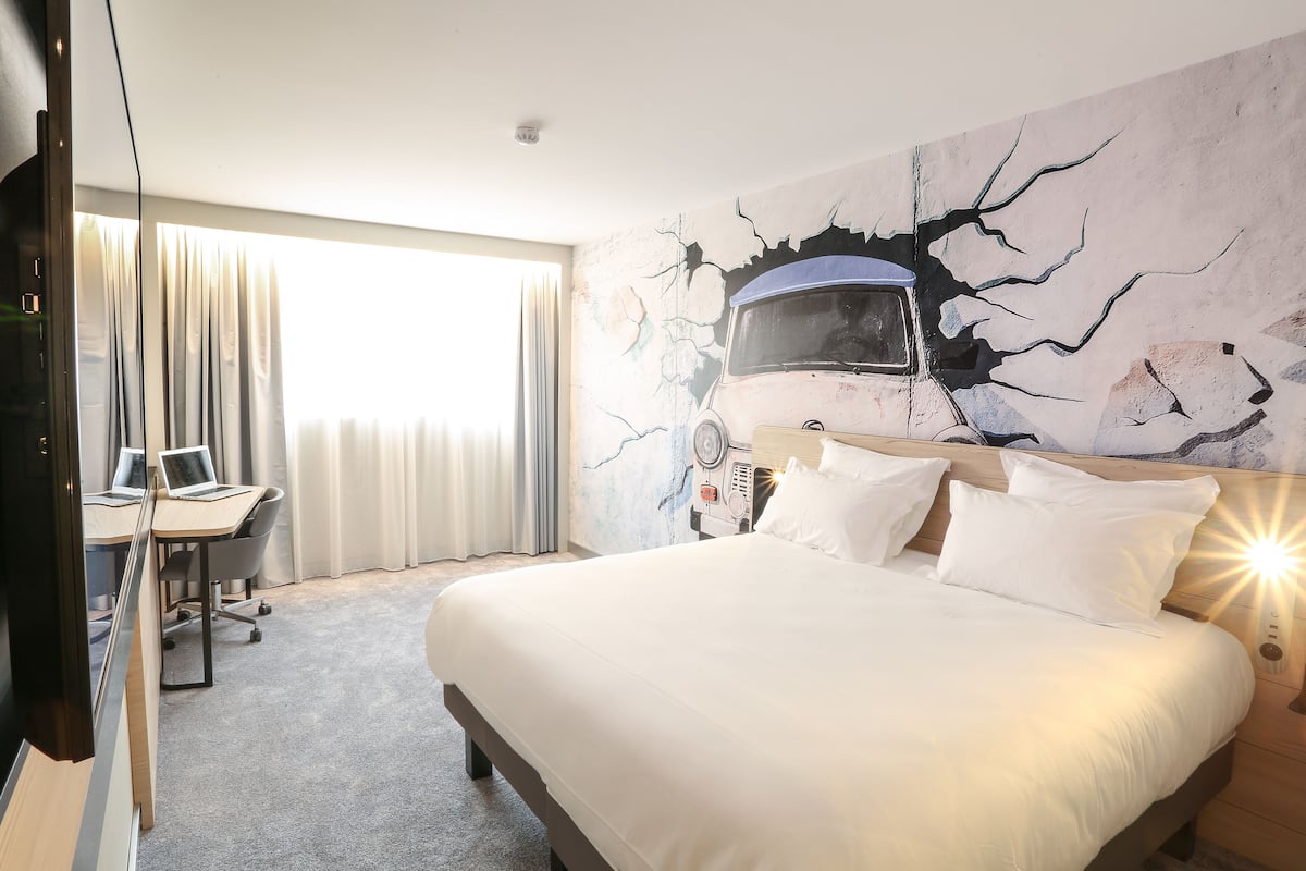 Minibar, bureau, rideaux occultants, chambres insonorisées