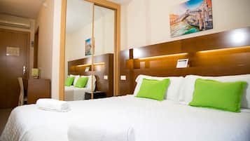 Minibar, desk, blackout curtains, iron/ironing board