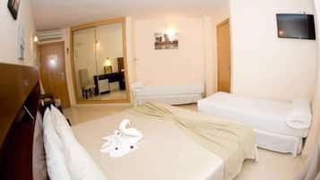 Minibar, desk, blackout curtains, iron/ironing board