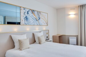 Desk, blackout drapes, soundproofing, iron/ironing board